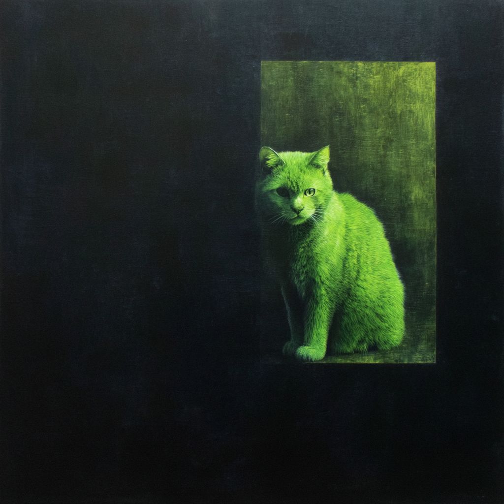 Un gato verde en un lienzo cuadrado negro